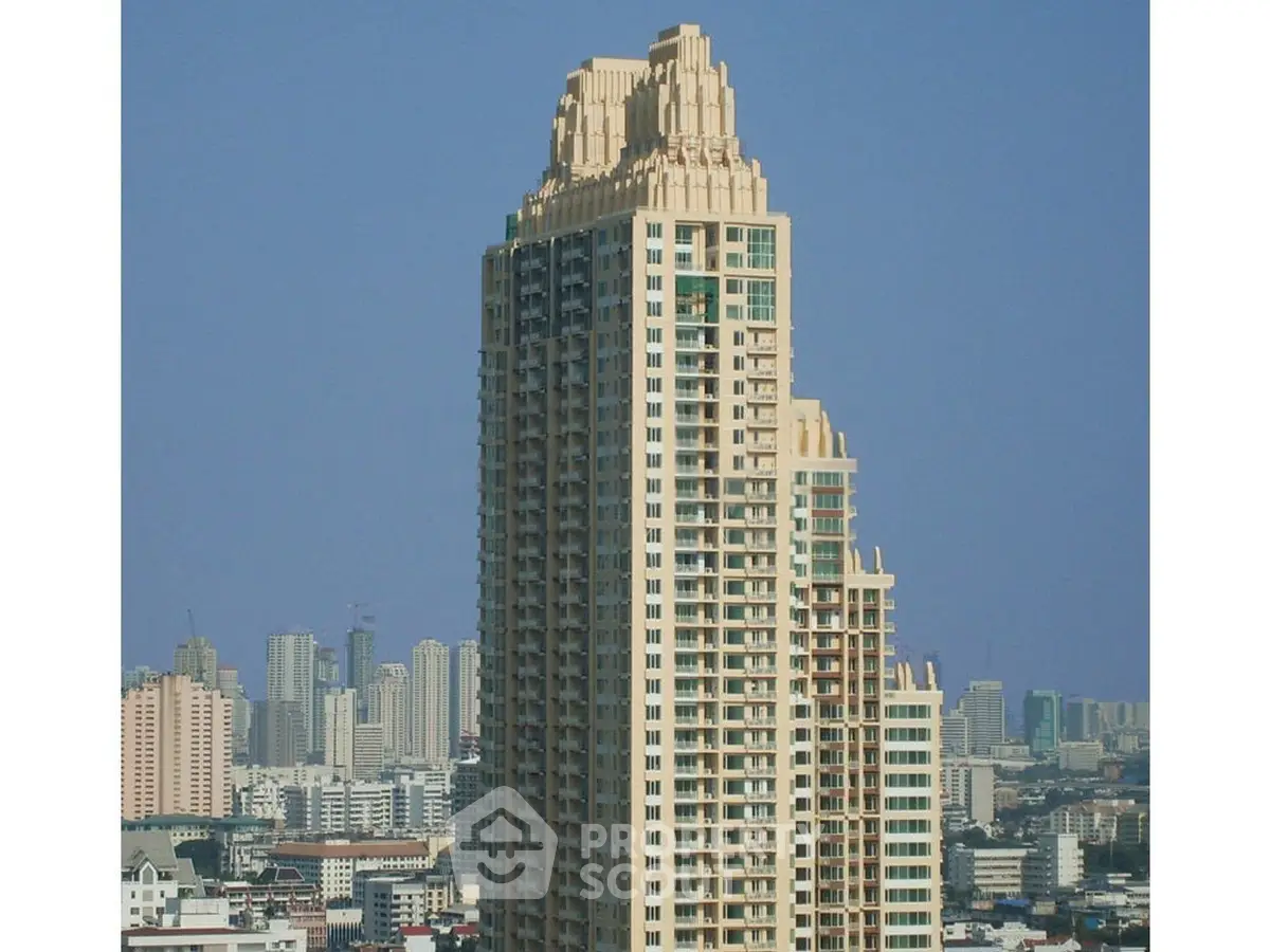 Stunning high-rise building with unique architectural design in urban skyline.