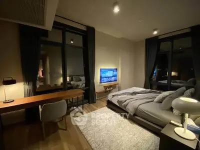 Luxurious modern bedroom with stylish decor and ambient lighting, featuring a cozy bed and elegant workspace.