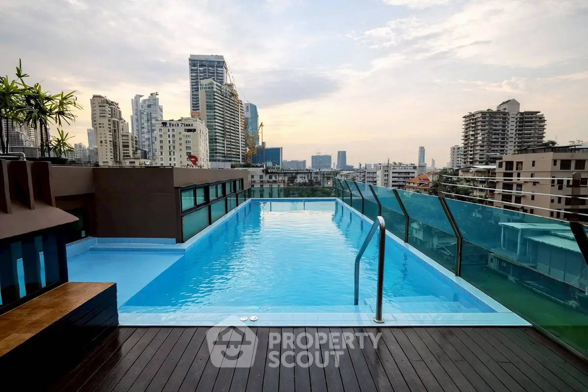 Stunning rooftop pool with city skyline views, perfect for luxury urban living.