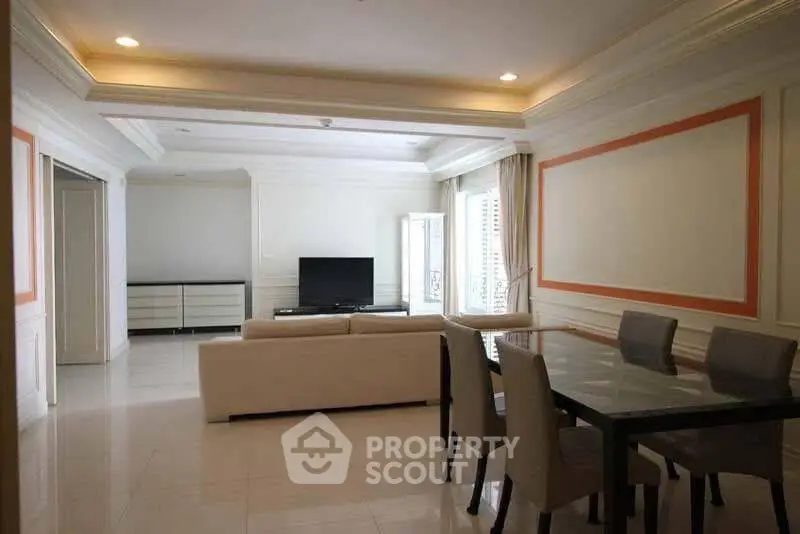 Spacious living room with elegant dining area and modern decor