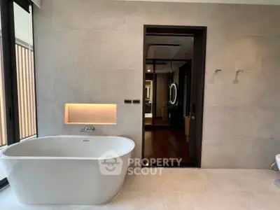 Luxurious bathroom with freestanding bathtub and modern design