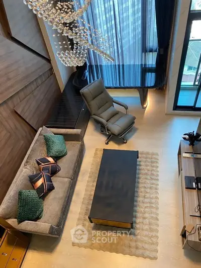 Luxurious living room with modern decor and large window view