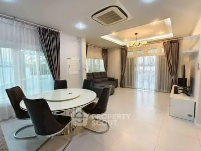 Spacious modern living room with elegant dining area and stylish furniture