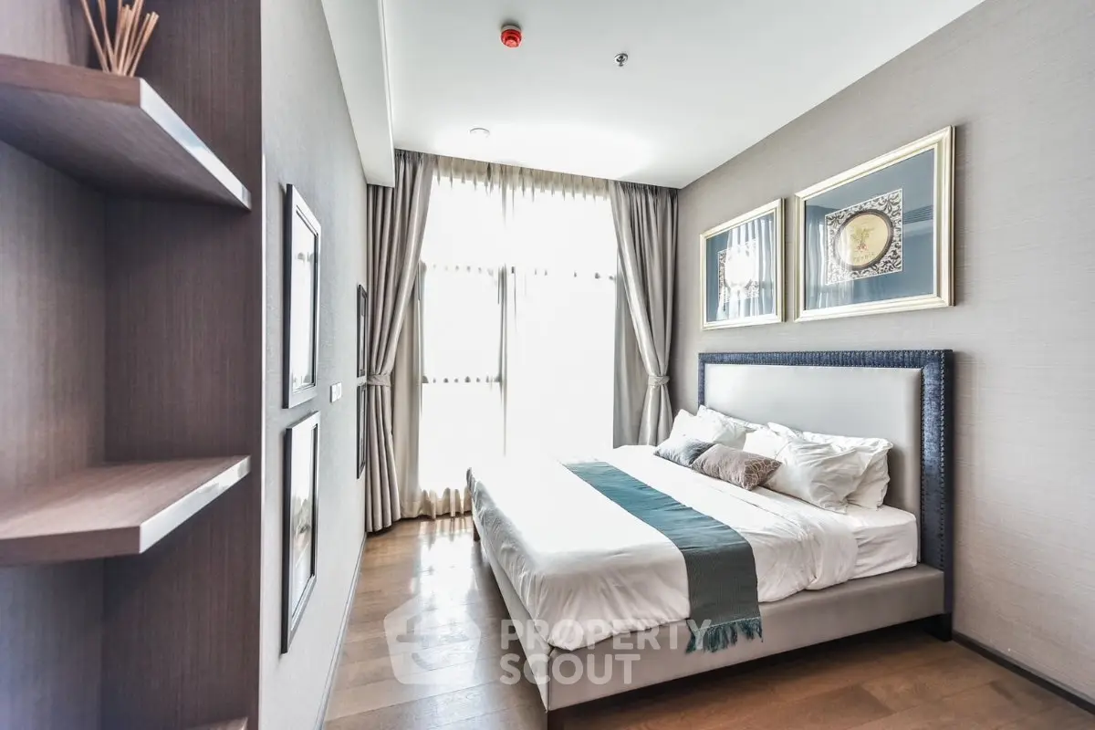 Luxurious bedroom with elegant decor and natural light in modern apartment
