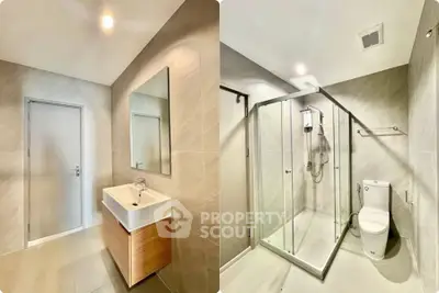 Modern bathroom with sleek shower and stylish vanity in contemporary design.