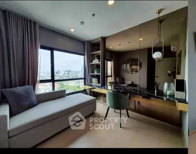 Modern living room with city view, stylish decor, and natural light