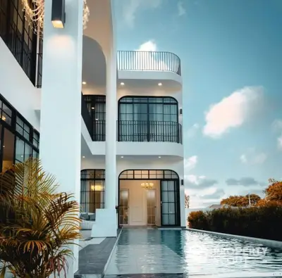 Luxurious modern villa with sleek architecture and private pool, offering stunning views and elegant design.