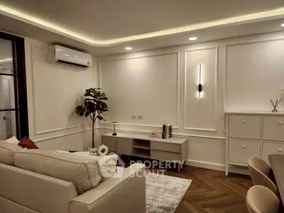 Modern living room with elegant decor and ambient lighting
