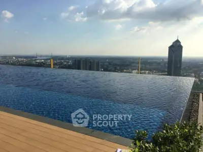 Stunning rooftop infinity pool with panoramic city skyline view