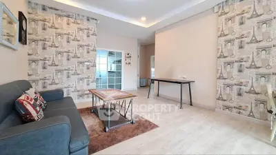 Spacious living room with stylish decor and modern furniture, perfect for relaxation and entertaining.