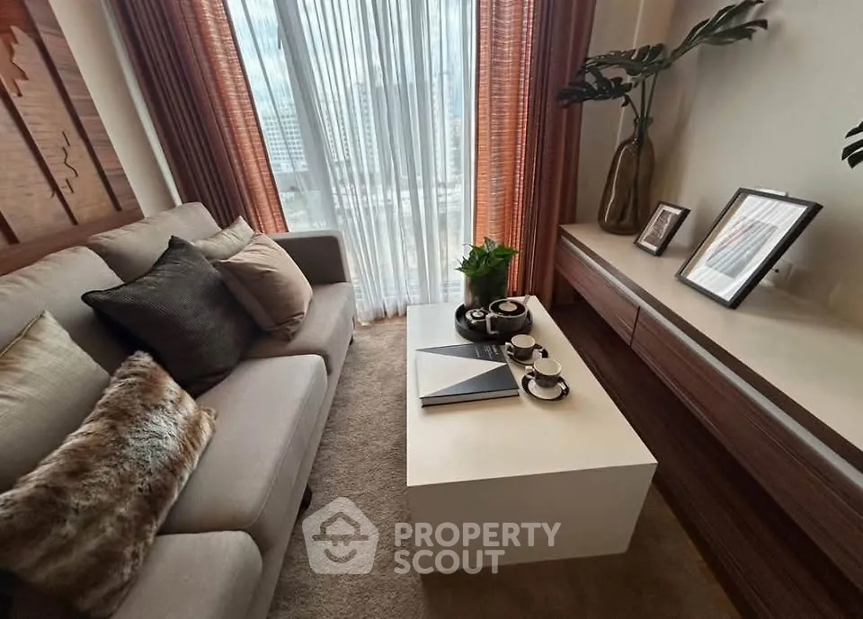 Stylish living room with cozy sofa and modern decor, perfect for relaxation.