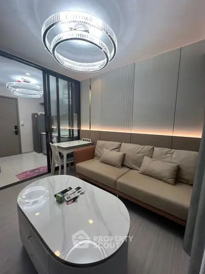 Modern living room with elegant lighting and stylish furniture