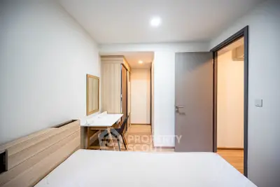 Modern bedroom with minimalist design and wooden furniture