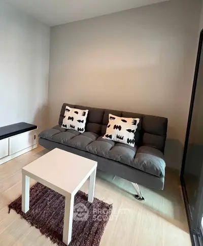 Modern living room with stylish sofa and minimalist decor