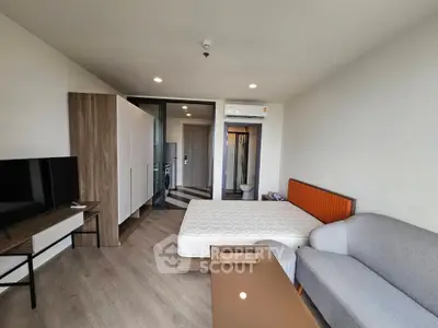 Modern bedroom with stylish furniture and natural light