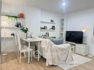 Charming modern living room with cozy decor and stylish furniture
