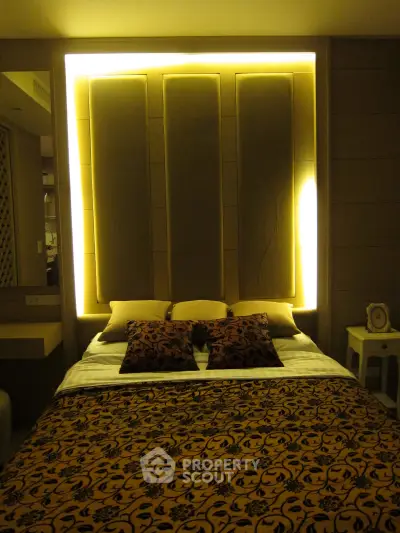 Luxurious bedroom with elegant lighting and stylish decor
