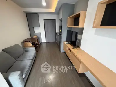 Modern living room with sleek furniture and open layout, perfect for urban living.