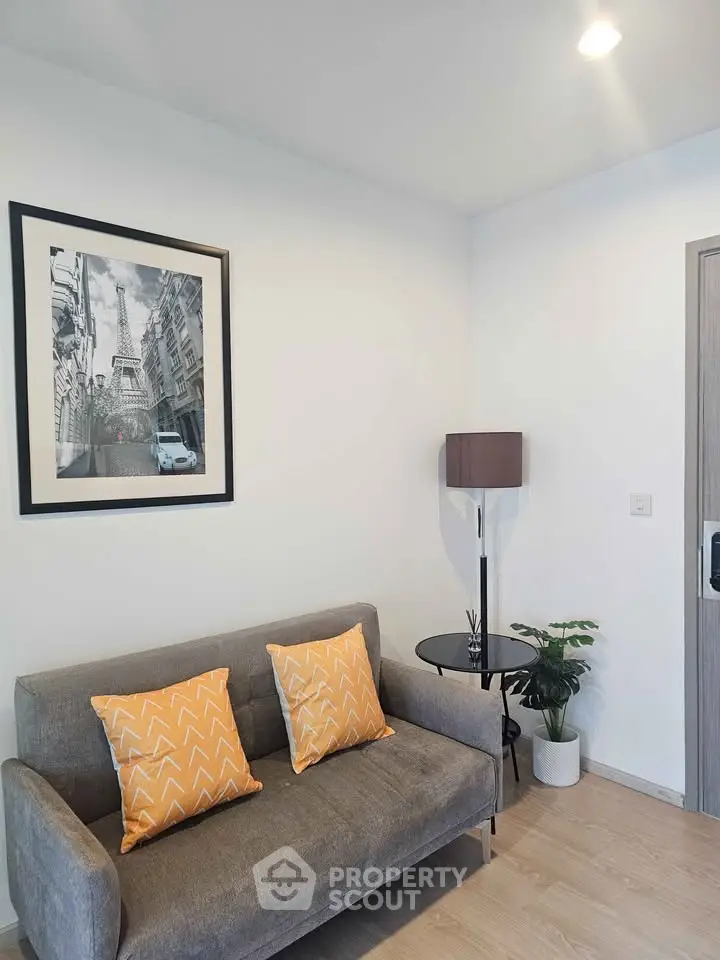 Modern living room with stylish decor and cozy seating area.