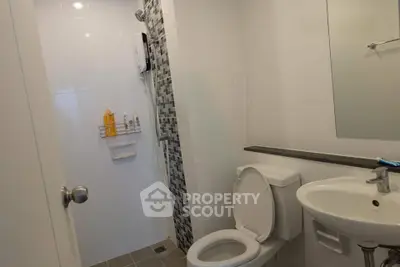 Modern bathroom with sleek fixtures and stylish tile accents