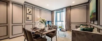 Elegant living room with modern dining area and large window view