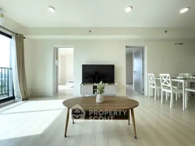 Spacious modern living room with elegant furniture and natural light