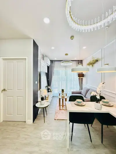 Modern living room with elegant dining area and stylish lighting fixtures