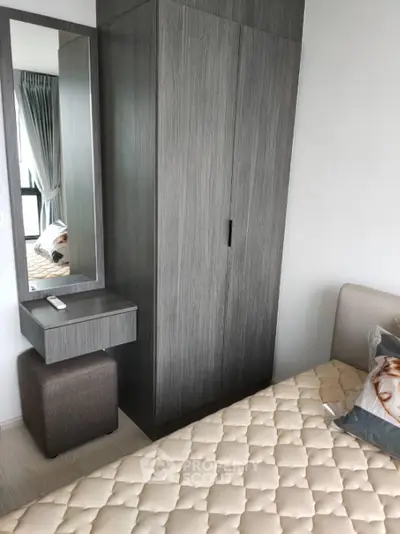 Cozy bedroom with modern wardrobe and stylish decor
