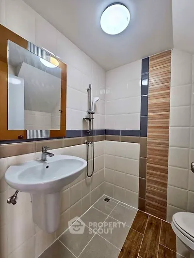 Modern bathroom with sleek fixtures and stylish tile design