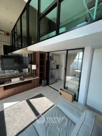 Modern loft apartment with floor-to-ceiling windows and stylish interior design