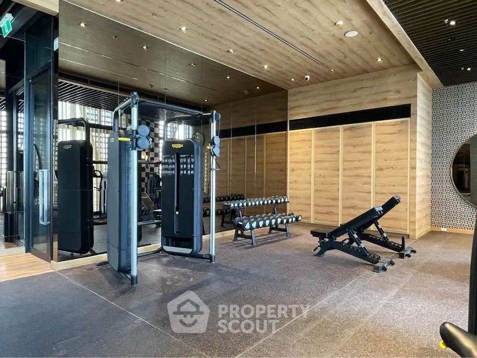 Modern gym with state-of-the-art equipment and wooden accents