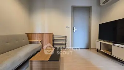 Modern living room with sleek furniture and minimalist design