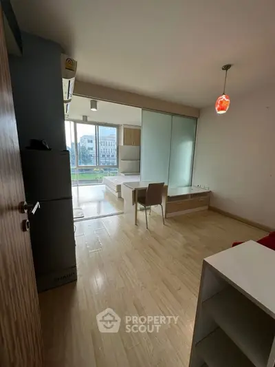 Modern studio apartment with open layout and city view