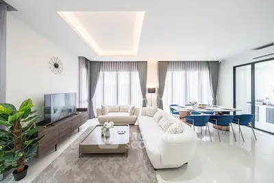 Spacious modern living room with elegant decor and natural light