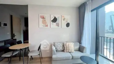 Modern living room with stylish decor and city view balcony