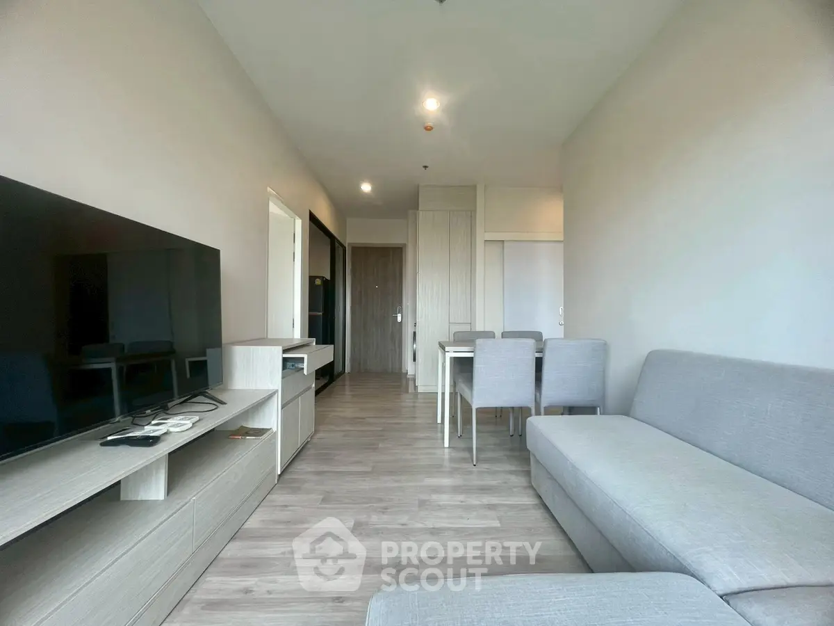 Modern living room with sleek furniture and open layout, perfect for contemporary living.