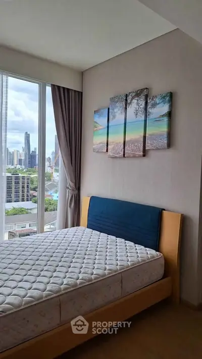Modern bedroom with city view and stylish decor