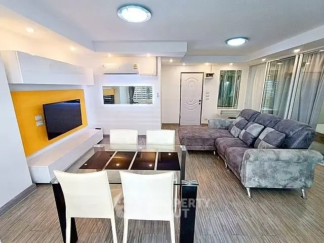 Modern living room with stylish furniture and open layout, perfect for entertaining.