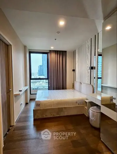 Modern bedroom with city view and stylish decor