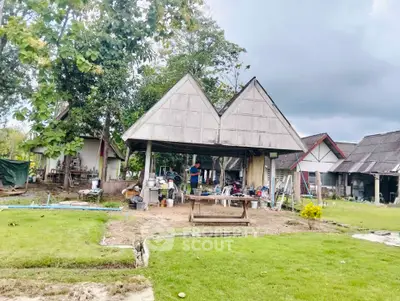 Charming rustic property with traditional architecture and lush green surroundings, perfect for serene living.