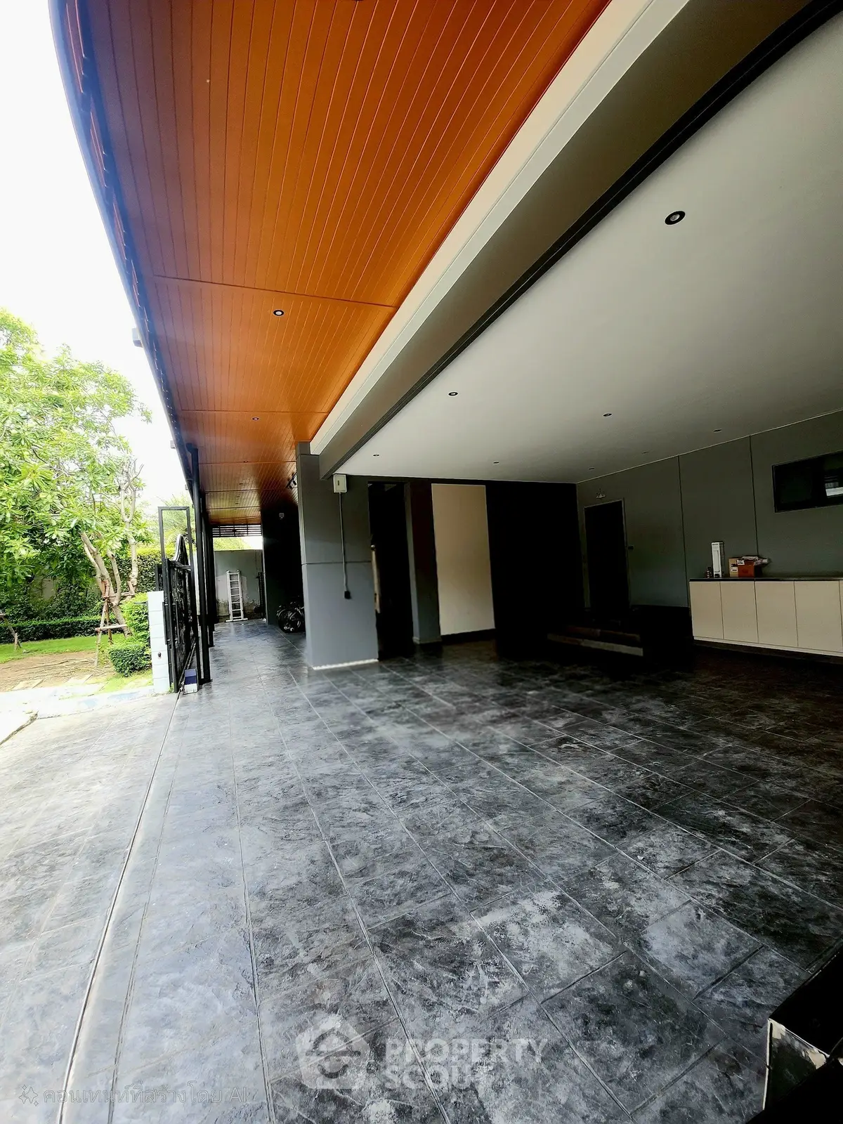 Spacious modern entrance with sleek design and ample natural light