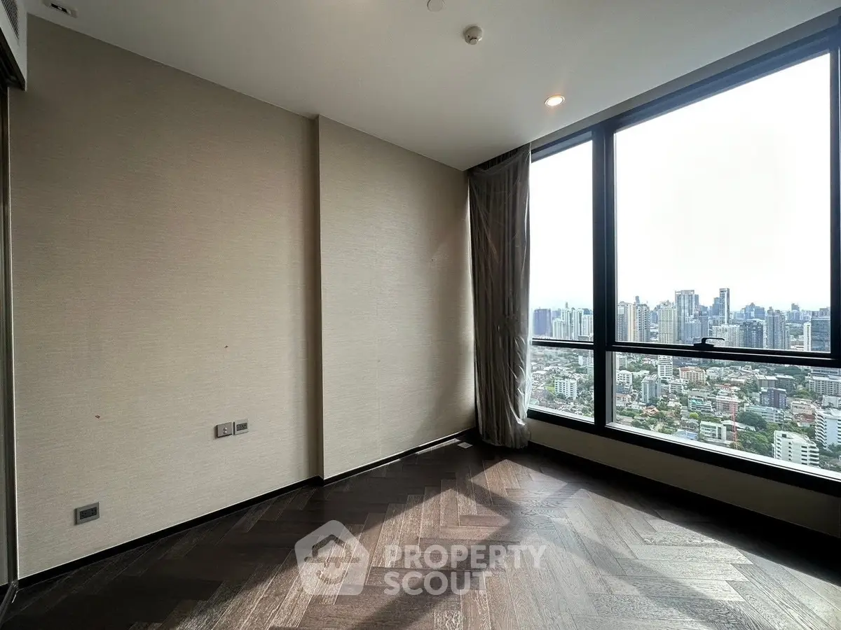 Spacious corner unit with stunning city view and elegant flooring.