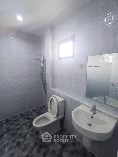 Modern bathroom with sleek fixtures and stylish tile design