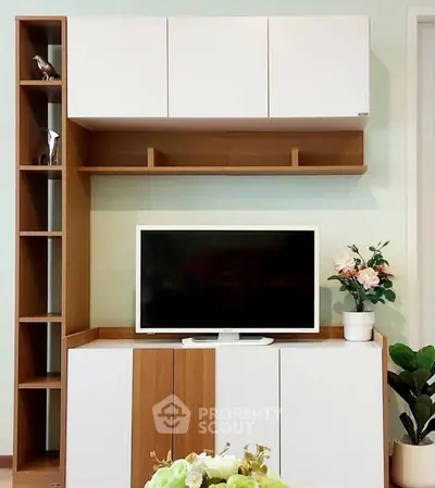 Modern living room with sleek TV cabinet and stylish decor