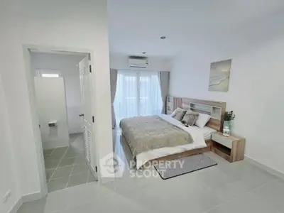 Modern bedroom with ensuite bathroom and stylish decor