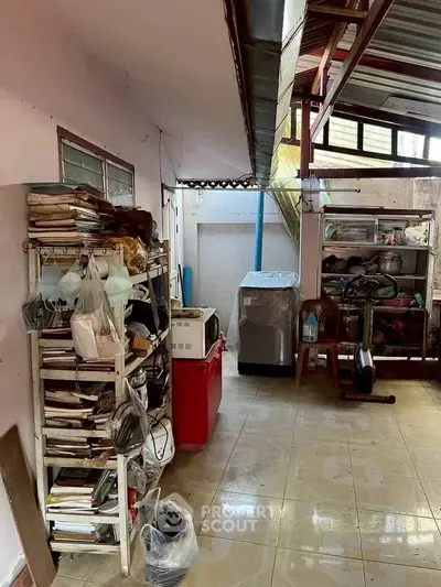 Spacious storage area with shelves and exercise equipment, ideal for organizing and fitness.