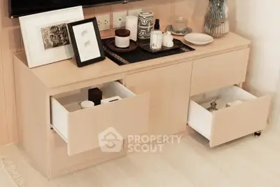 Stylish modern living room with elegant wooden cabinet and decorative items.