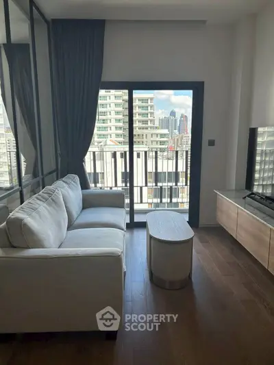 Modern living room with city view and stylish furniture