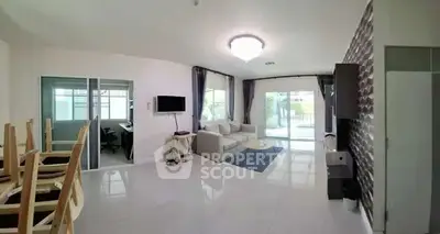 Spacious modern living room with elegant decor and natural light