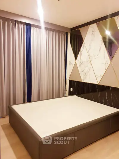 Luxurious bedroom with modern design and elegant marble accents